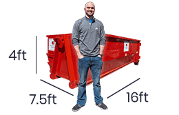man in front of 15 yard roll off dumpster rental