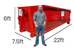 man in front of 30 yard roll off dumpster rental