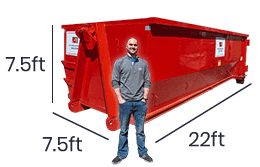 man in front of 40 yard roll off dumpster rental
